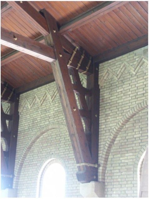 The beautiful wooden rafters by architect Jan van der Laan.
